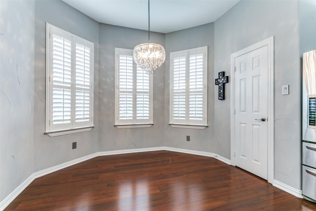 1121 Riverwalk Ct, Colleyville, TX 76034 - unfurnished dining area with wood finished floors, a chandelier, and plenty of natural light