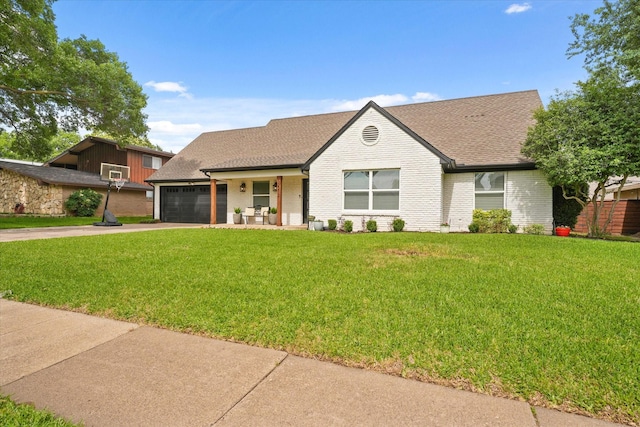 12212 Ridgefair Pl, Farmers Branch, TX 75234 - view of front of home featuring a shingled roof, brick siding, concrete driveway, and a front lawn