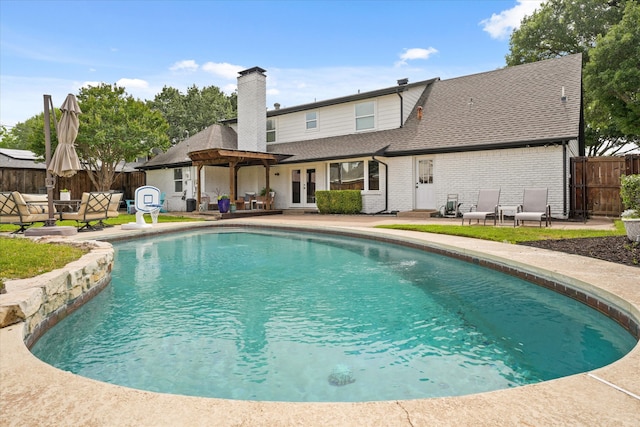 12212 Ridgefair Pl, Farmers Branch, TX 75234 - view of pool with a patio area, french doors, and a pergola