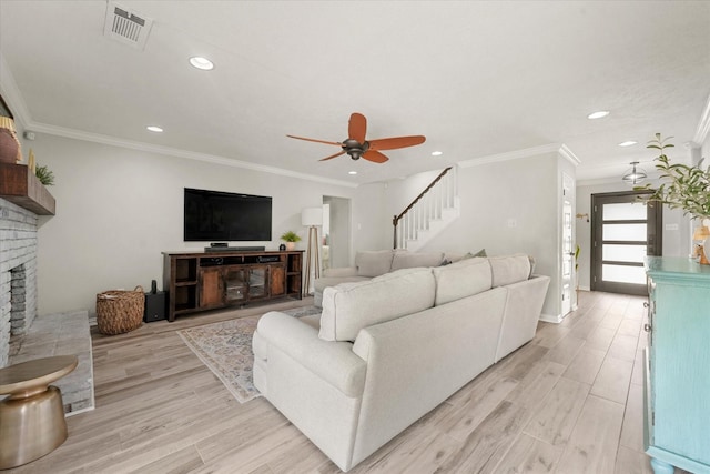 12212 Ridgefair Pl, Farmers Branch, TX 75234 - living area with a ceiling fan, a fireplace, light wood-type flooring, recessed lighting, and crown molding