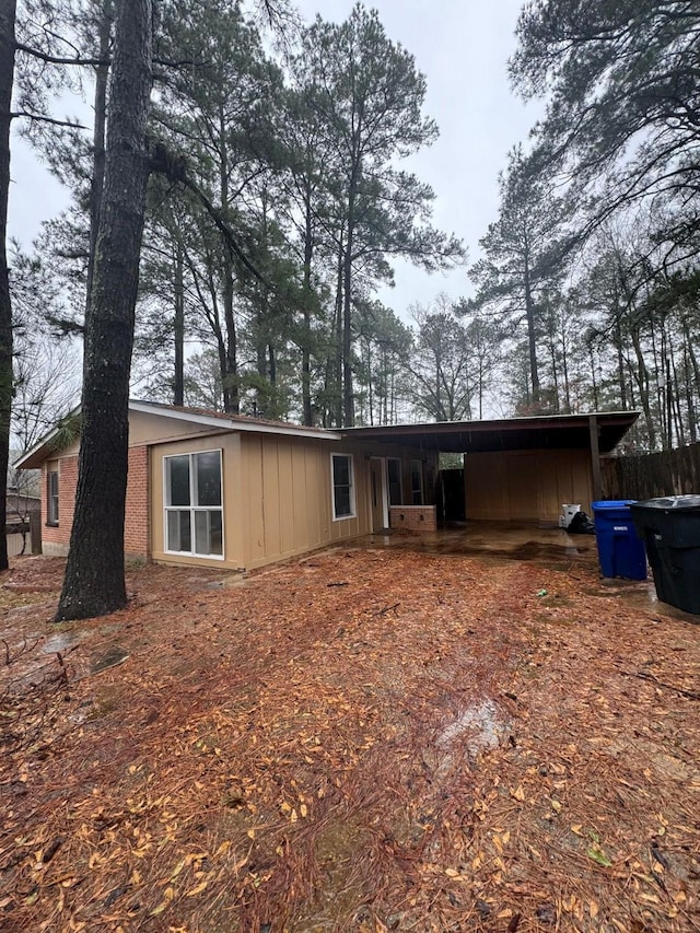825 Willow Dr, Shreveport, LA 71118 - rear view of property featuring an attached carport