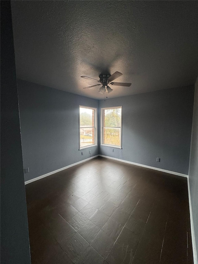 825 Willow Dr, Shreveport, LA 71118 - empty room featuring ceiling fan, baseboards, and a textured ceiling