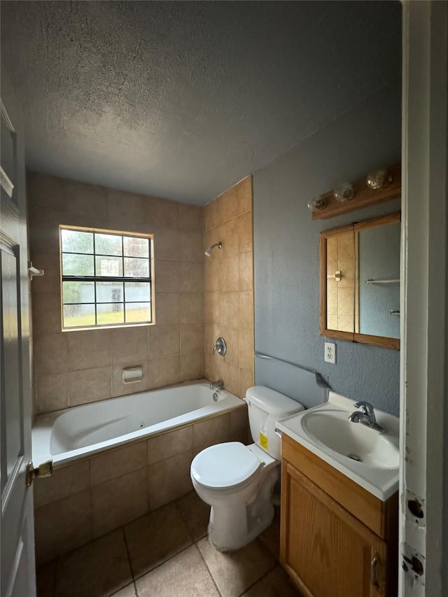 825 Willow Dr, Shreveport, LA 71118 - full bathroom with a textured ceiling, tile patterned flooring, tiled shower / bath, toilet, and vanity