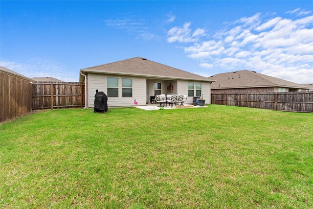 516 Wrangler Dr, Josephine, TX 75189 - rear view of property featuring a patio area and a shingled roof