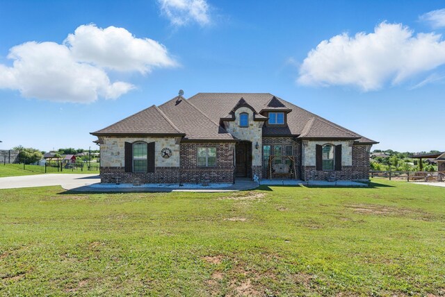 1063 Dominique Dr, Weatherford, TX 76087 - french country home with brick siding and stone siding