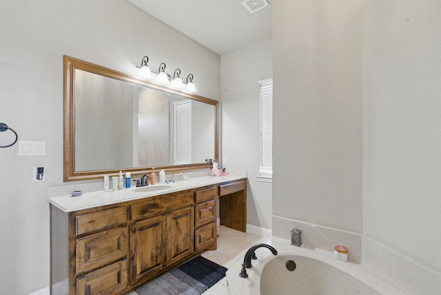 1063 Dominique Dr, Weatherford, TX 76087 - full bathroom with vanity, a garden tub, and tile patterned floors
