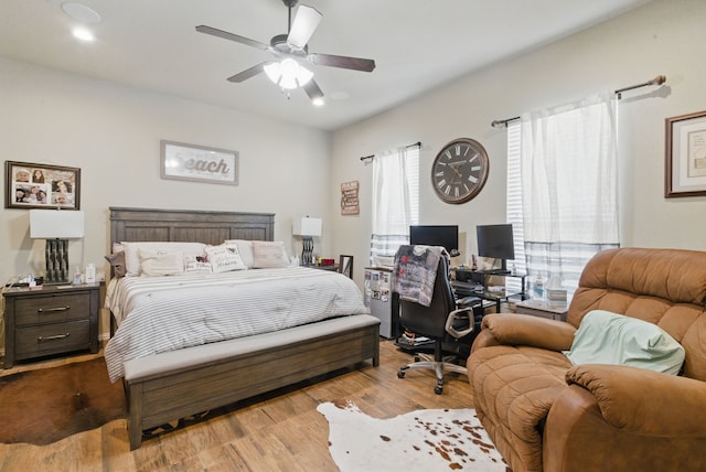 1063 Dominique Dr, Weatherford, TX 76087 - bedroom with wood finished floors and a ceiling fan