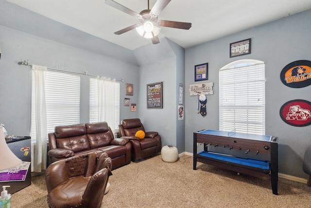 1063 Dominique Dr, Weatherford, TX 76087 - carpeted living area featuring a ceiling fan, baseboards, and lofted ceiling