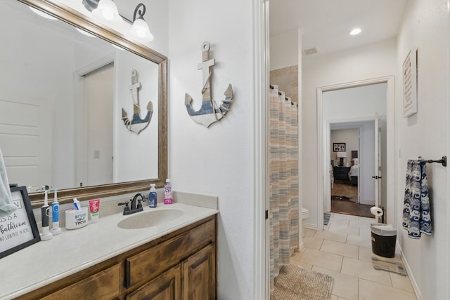 1063 Dominique Dr, Weatherford, TX 76087 - full bathroom featuring vanity, tile patterned flooring, a shower with curtain, and toilet