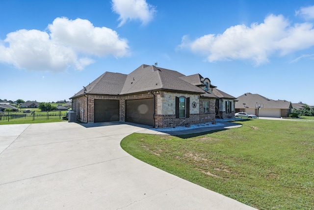 1063 Dominique Dr, Weatherford, TX 76087 - view of front of house featuring a garage, brick siding, and concrete driveway