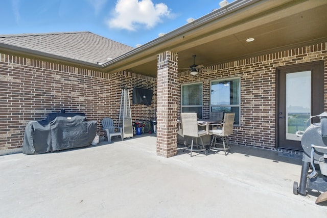 1063 Dominique Dr, Weatherford, TX 76087 - view of patio / terrace with ceiling fan, outdoor dining area, and a grill