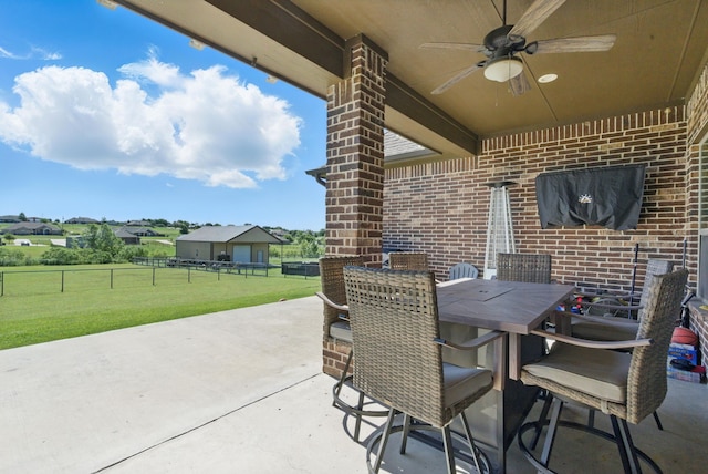 1063 Dominique Dr, Weatherford, TX 76087 - view of patio / terrace featuring ceiling fan and outdoor dining area