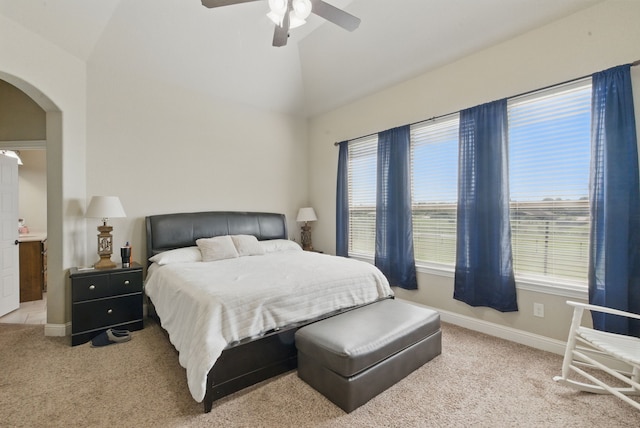 1063 Dominique Dr, Weatherford, TX 76087 - bedroom featuring arched walkways, carpet, baseboards, lofted ceiling, and a ceiling fan