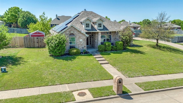 1730 Vista Ridge Dr W, Midlothian, TX 76065 - view of front of house featuring solar panels, brick siding, and covered porch