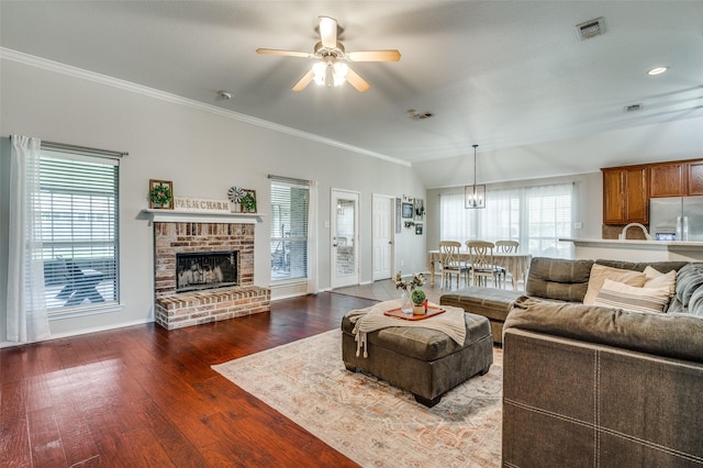 1730 Vista Ridge Dr W, Midlothian, TX 76065 - living area featuring ornamental molding, a ceiling fan, baseboards, dark wood finished floors, and a fireplace