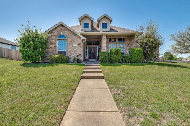 1730 Vista Ridge Dr W, Midlothian, TX 76065 - view of front facade with brick siding and roof with shingles