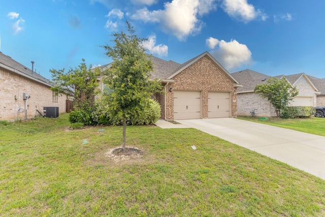 604 Hazeltine Rd, Red Oak, TX 75154 - view of front of property with an attached garage, driveway, brick siding, a front lawn, and central AC unit