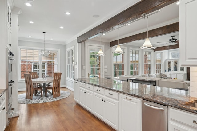 3008 Rosedale Ave, University Park, TX 75205 - kitchen with white cabinetry, wood finished floors, a ceiling fan, crown molding, and recessed lighting