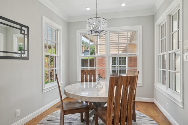 3008 Rosedale Ave, University Park, TX 75205 - dining area with a chandelier, plenty of natural light, wood finished floors, crown molding, and recessed lighting