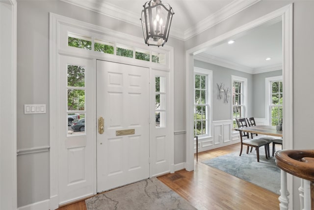 3008 Rosedale Ave, University Park, TX 75205 - entrance foyer featuring a chandelier, wood finished floors, crown molding, wainscoting, and recessed lighting