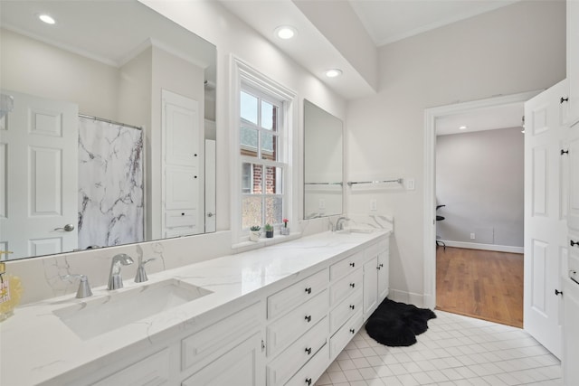 3008 Rosedale Ave, University Park, TX 75205 - full bath with double vanity, crown molding, and recessed lighting