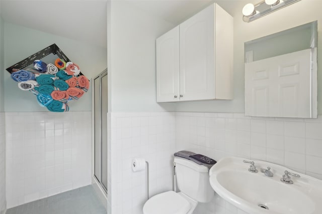 3008 Rosedale Ave, University Park, TX 75205 - full bath with a sink, tile walls, a stall shower, toilet, and a wainscoted wall