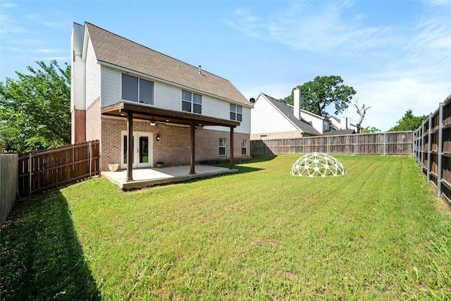 529 Mattie Ln, Lake Dallas, TX 75065 - rear view of house featuring brick siding, ceiling fan, and a patio area