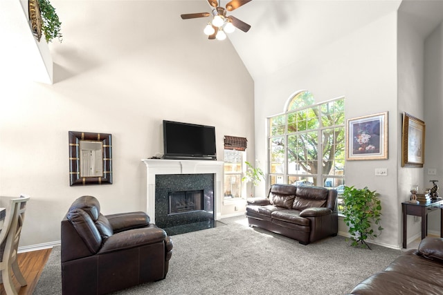 529 Mattie Ln, Lake Dallas, TX 75065 - living room featuring high vaulted ceiling, ceiling fan, baseboards, and a fireplace with flush hearth
