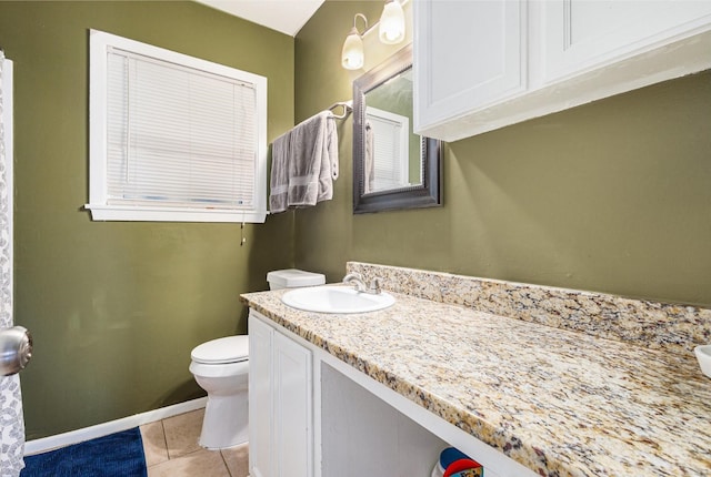 6217 Kentwood Pl, Fort Worth, TX 76112 - bathroom with tile patterned flooring, vanity, toilet, and baseboards
