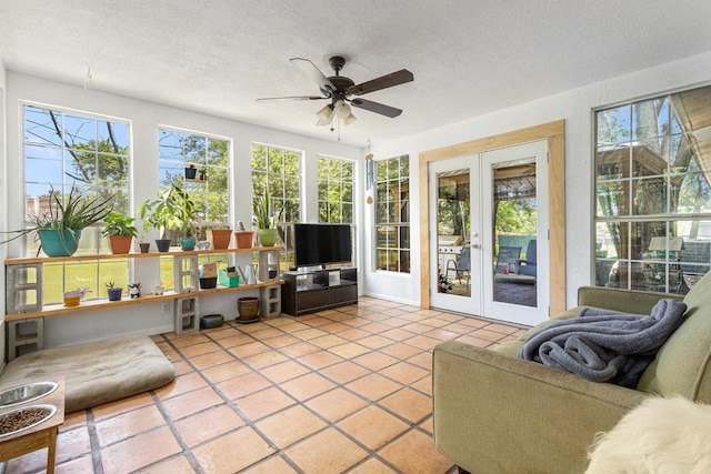 6217 Kentwood Pl, Fort Worth, TX 76112 - sunroom with french doors, healthy amount of natural light, tile patterned floors, and a textured ceiling
