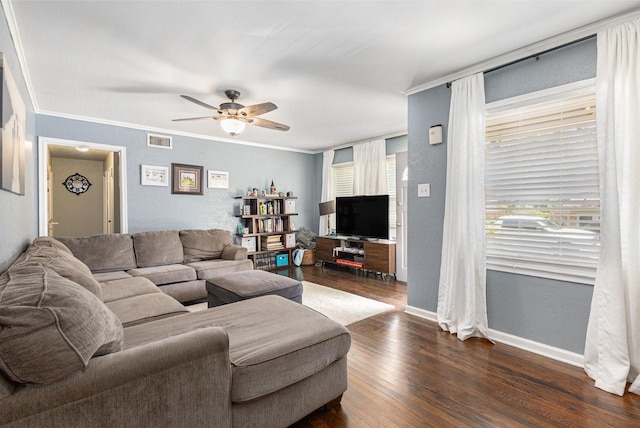 6217 Kentwood Pl, Fort Worth, TX 76112 - living area featuring dark wood-style floors, ceiling fan, baseboards, healthy amount of natural light, and ornamental molding
