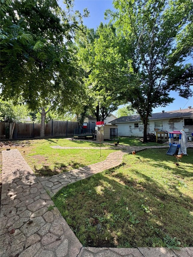 5521 Hightower St, Fort Worth, TX 76112 - view of yard with an outbuilding