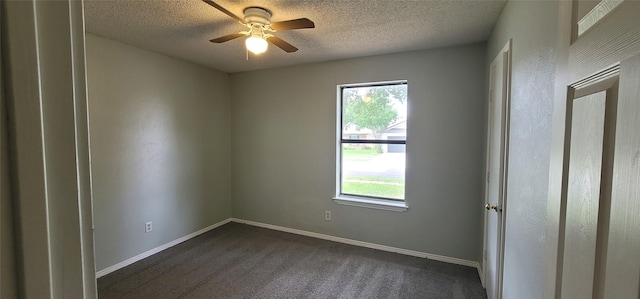 6436 Green Ridge Dr, Watauga, TX 76148 - unfurnished room with plenty of natural light, a textured ceiling, ceiling fan, dark carpet, and baseboards