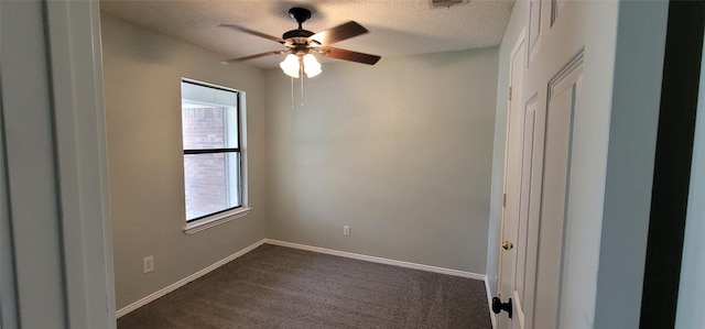 6436 Green Ridge Dr, Watauga, TX 76148 - unfurnished room with a textured ceiling, a ceiling fan, dark colored carpet, and baseboards
