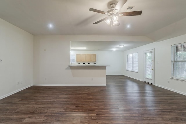 904 Havenbrook Dr, Arlington, TX 76001 - unfurnished living room with dark wood finished floors, a ceiling fan, baseboards, and vaulted ceiling