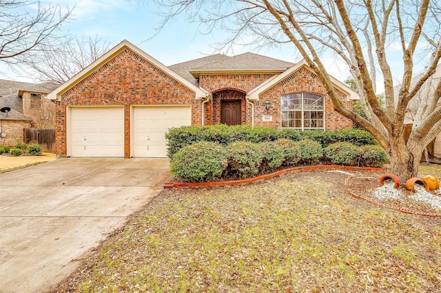 8016 Pretoria Pl, Fort Worth, TX 76123 - view of front facade featuring brick siding, a garage, concrete driveway, and a shingled roof