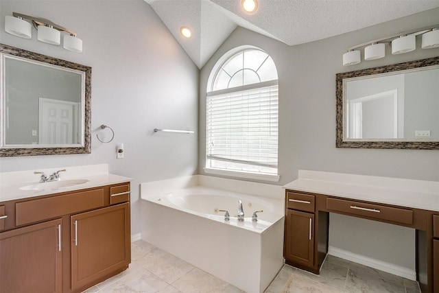 8016 Pretoria Pl, Fort Worth, TX 76123 - full bathroom with a bath, vanity, lofted ceiling, a textured ceiling, and marble look tile flooring