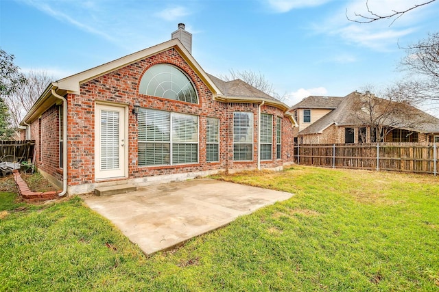 8016 Pretoria Pl, Fort Worth, TX 76123 - rear view of house featuring brick siding, a chimney, and a patio