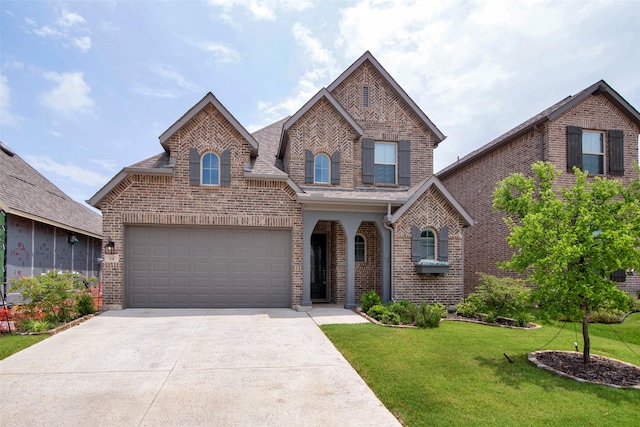 4166 Carter Ct, Denison, TX 75020 - view of front of home featuring brick siding, driveway, and a front lawn