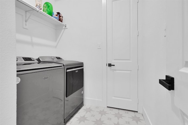 4166 Carter Ct, Denison, TX 75020 - laundry area featuring washer and dryer, baseboards, and light flooring