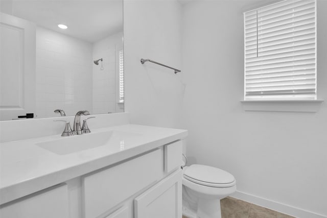4166 Carter Ct, Denison, TX 75020 - full bath featuring toilet, a tile shower, vanity, tile patterned flooring, and baseboards