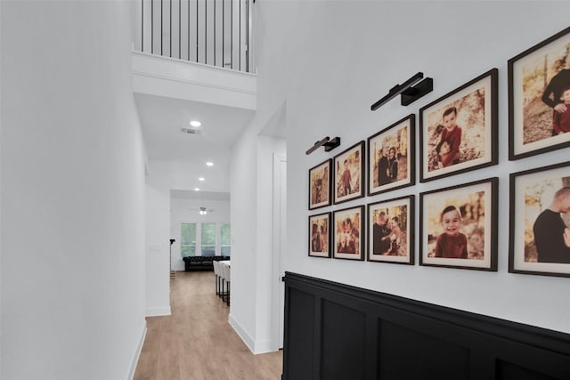 4166 Carter Ct, Denison, TX 75020 - corridor featuring light wood-type flooring, recessed lighting, baseboards, and a high ceiling