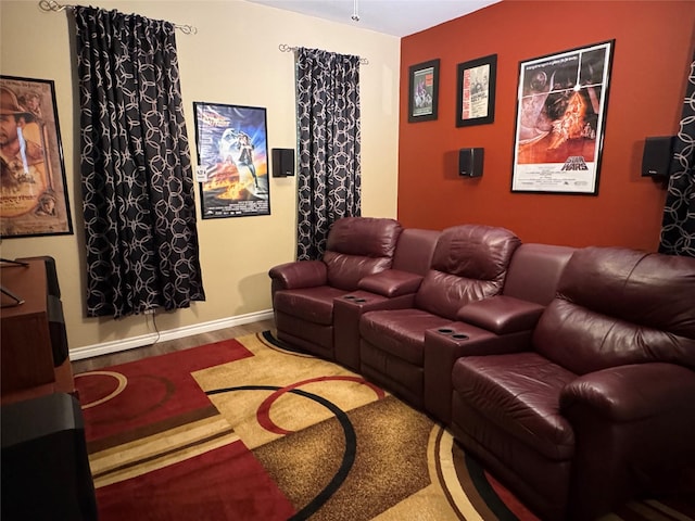 1621 Jasmine Trl, Savannah, TX 76227 - home theater room with wood finished floors and baseboards