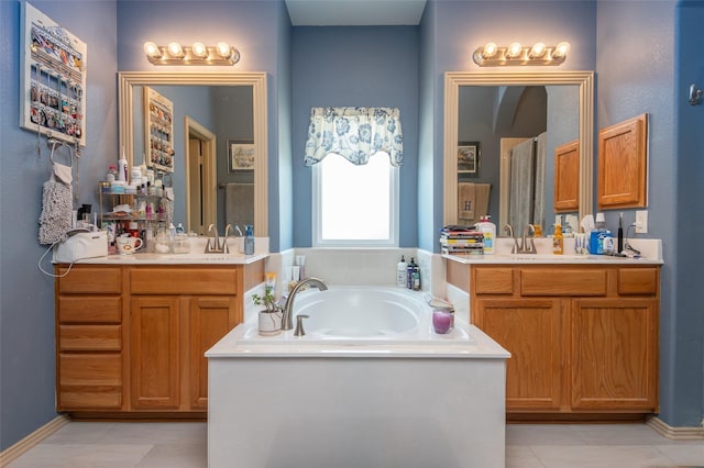 1621 Jasmine Trl, Savannah, TX 76227 - bathroom featuring two vanities and a bath