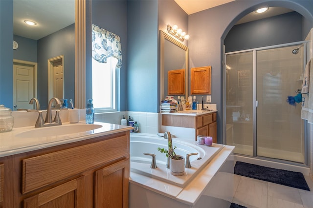 1621 Jasmine Trl, Savannah, TX 76227 - full bathroom with a shower stall, vanity, and a bath