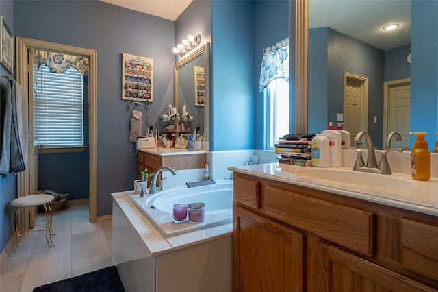 1621 Jasmine Trl, Savannah, TX 76227 - bathroom with a bath, vanity, and plenty of natural light