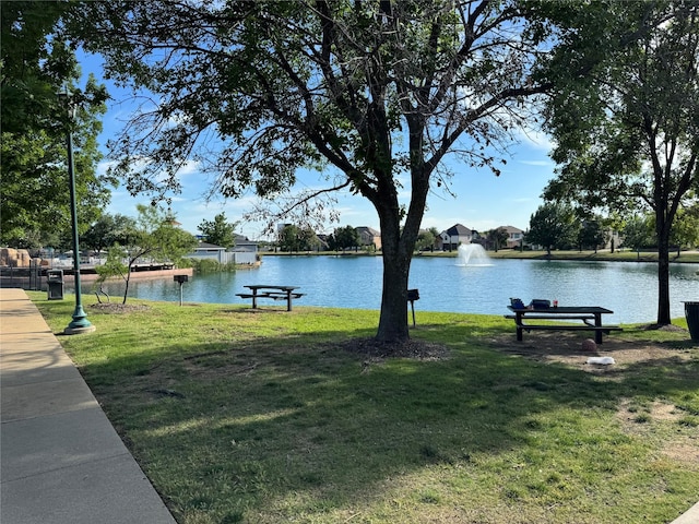 1621 Jasmine Trl, Savannah, TX 76227 - view of home's community with a lawn and a water view