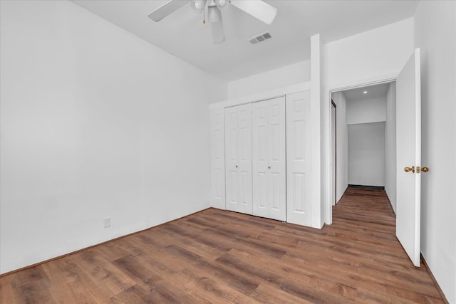 2700 Pine Ave, Waco, TX 76708 - unfurnished bedroom featuring wood finished floors, a closet, and ceiling fan