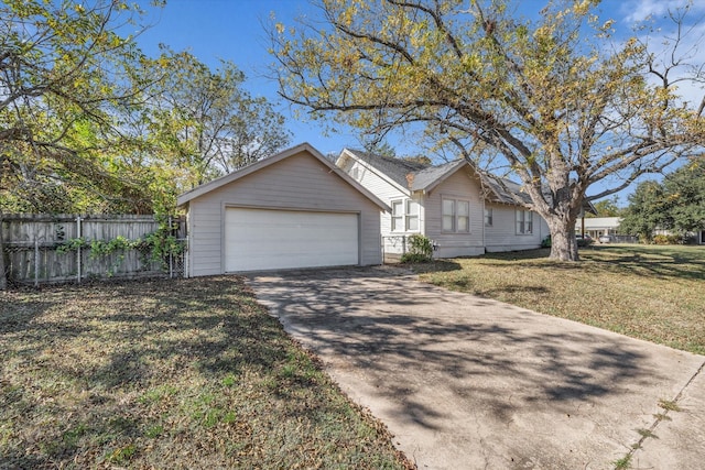 2700 Pine Ave, Waco, TX 76708 - ranch-style home with concrete driveway and a garage