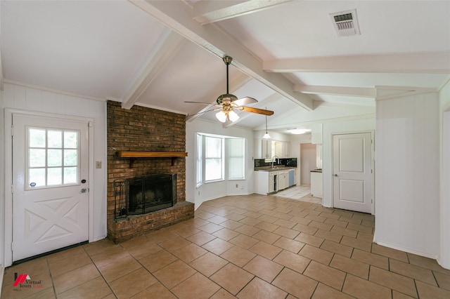 9104 Rosedown Cir, Shreveport, LA 71118 - unfurnished living room featuring ceiling fan, a fireplace, a sink, and light tile patterned floors